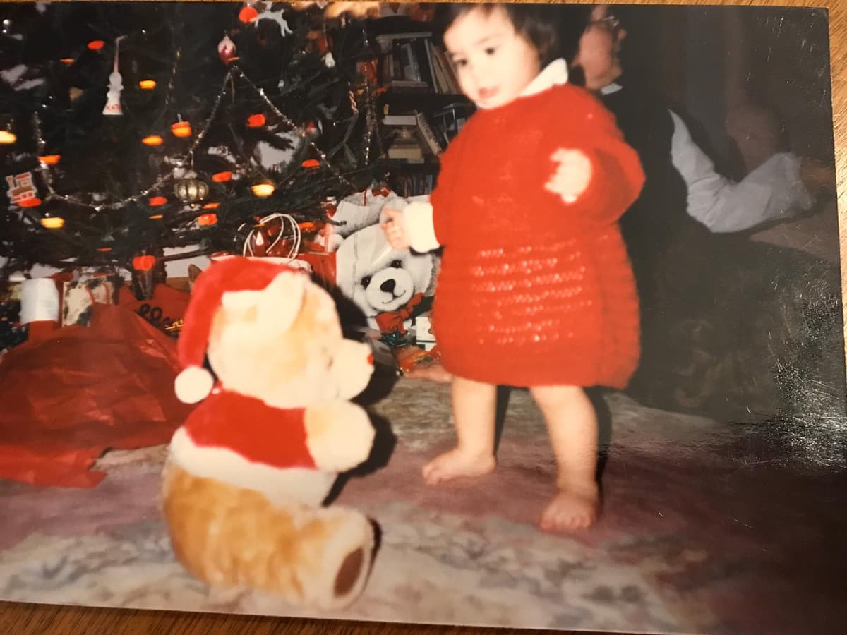 Sarit as a toddler at Christmas
